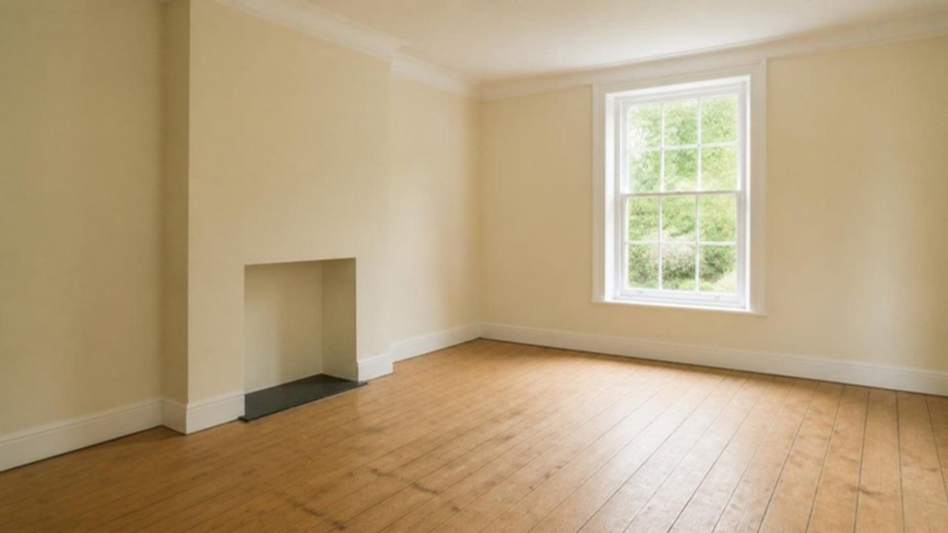 A cleared, bright empty room after a house clearance